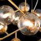 Candelabre, Lustre - Lustra deosebita cu 24 de surse de lumina Dallas, auriu mat/ chihlimbar